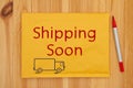 Shipping Soon message on yellow bubble mailing envelope