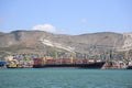 Ships are being unloaded at the seaport. Russia, Novorossiysk, July 22, 2019