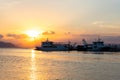 Ships and boats in harbour at sunset at the Greek island of Evia Royalty Free Stock Photo