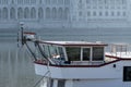 Ships cabin on Danube river against parliament building in Budapest, Hungary Royalty Free Stock Photo