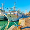 Ships on canal by lighthous in Rimini