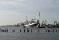 Ships and cranes in the harbour of Klaipeda