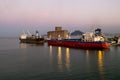 Ships and ferries in the port of La Gullet in Tunisia at sunset