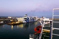 Ships and ferries in the port of La Gullet in Tunisia at sunset