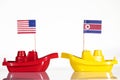 Ships with the flags of united states and north korea