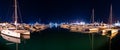 Ships in the harbor under the night starry sky. Black Sea, Sochi, Europe Royalty Free Stock Photo