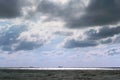 Ships on the horizon, stormy sea, gloomy sky