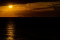 Ships on the horizon during sunset in the Black sea