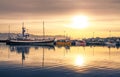 Ships lying in the harbor of Husavik at sunset, Iceland Royalty Free Stock Photo