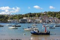 Ships moored in Dartmouth harbour with Britannia Royal Naval College in the background, Devon, England, Royalty Free Stock Photo