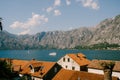 Ships sail on the Kotor Bay against the backdrop of mountains