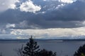 Ships sailing Puget Sound under a dramatic sky Royalty Free Stock Photo