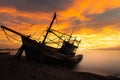 Shipwreck abandoned on the beach and sunlight