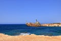 Shipwreck of the abandoned ship Edro III on a rocky coast at Akrotiri Beach in Cyprus Royalty Free Stock Photo