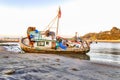 Shipwreck Awash on Beach