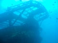 Shipwreck at the bottom of the ocean