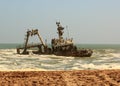 Shipwreck close to shore on Skeleton Coast, Namibia