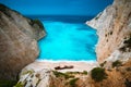 Shipwreck in Navagio beach. Azure turquoise sea water and paradise sandy beach. Famous tourist visiting landmark on Royalty Free Stock Photo