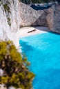 Shipwreck on Navagio beach. Azure turquoise sea water and paradise sandy beach. Famous tourist visiting landmark on Royalty Free Stock Photo