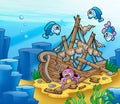 Shipwreck with octopus and fishes