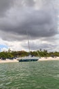 Shipwrecked sailboat on the beach of Clam Pass in Naples, Florida