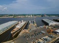 Shipyard industry aerial view of large ship big tanker under repairing in floating dock on the river Delaware Pennsylvania Royalty Free Stock Photo