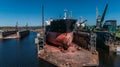 Tanker vessel repair in dry dock Shipyard, Drone shot Royalty Free Stock Photo