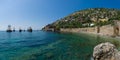 Shipyard (Tersane) and the ruins of a medieval fortress (Alanya Castle) on the mountainside.