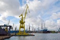 Shipyards and docks with cranes and other heavy machinery near in industrial part of old town Gdansk, Baltic coast, Gdansk bay, Po Royalty Free Stock Photo