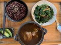 Shiquan Dabu chicken soup, sweet potato leaves, five-grain rice, pickled cucumbers Royalty Free Stock Photo