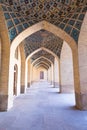 Beautiful old decorated painting mosaic on the arch of hallway o