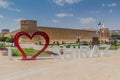 SHIRAZ, IRAN - JULY 6, 2019: I Love Shiraz sign and Karim Khan Citadel in Shiraz, Ira