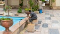 Muslim man taking ablution for prayer