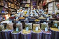 Bags and bowls with dried aromatic herbs and spices in a spice store on the Eastern Bazaar