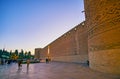 SHIRAZ, IRAN - OCTOBER 14, 2017: The frontage wall of Karim Khan citadel stretches along the crowded Shohada Square, decorated