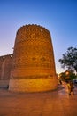 SHIRAZ, IRAN - OCTOBER 14, 2017: The medieval brick tower of Karim Khan citadel is covered with relief brick pattern, on October