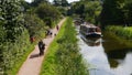 Shire Horse pulls a barge on The Grand Western Canal Tiverton In Devon