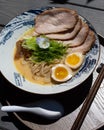 Shiro Miso Ramen Pork chasu, ajitsuke egg, menma, pork bone stock, chicken bone stock, and rye noodles Royalty Free Stock Photo