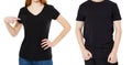 Shirt design and people concept - close up of young man and woman in blank black tshirt front isolated. Mock up template Royalty Free Stock Photo