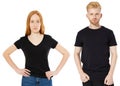 Shirt design and people concept - close up of young man and woman in blank black tshirt front isolated. Mock up template for Royalty Free Stock Photo
