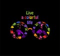 Shirt print with hippie sunglasses with colorful brush stroke and live a colorful life lettering on black background. Fashion desi