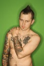 Shirtless Caucasian man with tattoos. Royalty Free Stock Photo