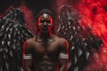 Shirtless dark angel in red smoky space Royalty Free Stock Photo