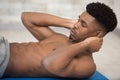 shirtless fitness instructor performs abs Royalty Free Stock Photo