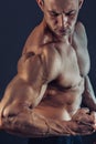 Shirtless male bodybuilder with muscular build strong abs showing. Shot of healthy muscular young man. Perfect fit, six Royalty Free Stock Photo