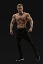 Shirtless male model posing muscular core