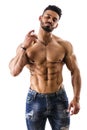 Shirtless male model spraying cologne Royalty Free Stock Photo