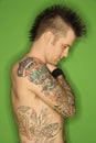 Shirtless male with tattoos. Royalty Free Stock Photo