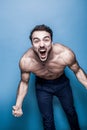 Shirtless man with beard on blue background Royalty Free Stock Photo