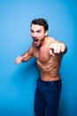 Shirtless man with beard on blue background Royalty Free Stock Photo